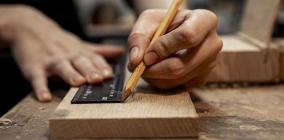 female-carpenter-working-studio-with-pencil_cropped.jpg